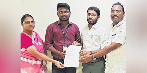 Vijayadurga Chandrasekhar showing his offer letter in Vizianagaram | express