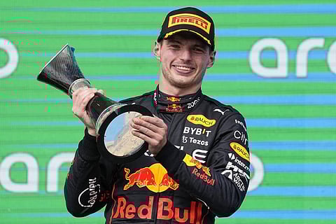 Red Bull driver Max Verstappen, of the Netherlands, raises the trophy after winning the Formula One U.S. Grand Prix auto race at Circuit of the Americas, on October 23, 2022. (Photo | AP)