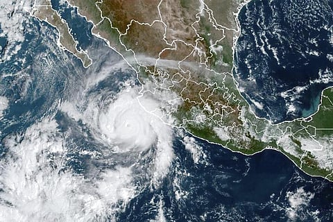 The satellite image provided by NOAA shows Hurricane Roslyn approaching the Pacific coast of Mexico on October 22, 2022.