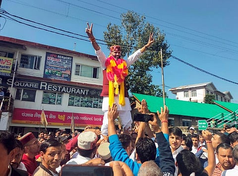 Independent candidate Vipin Nehria takes part in a road show after filing his nomination papers for the upcoming Himachal Pradesh Assembly elections, in Dharamshala, Oct 25, 2022. (Photo|PTI)