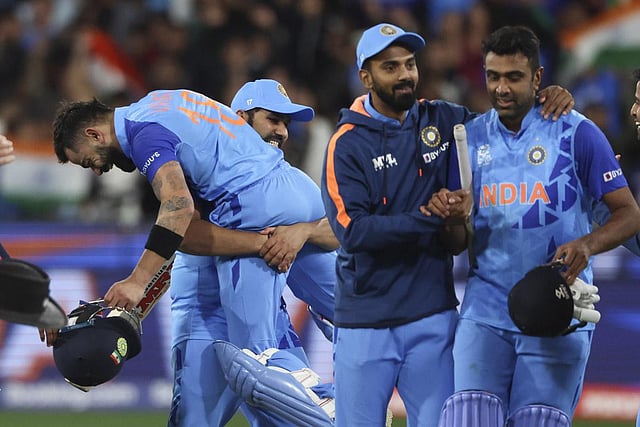 India's Virat Kohli is carried by Rohit Sharma after winning their T20 World Cup cricket match against Pakistan in Melbourne. (Photo | AP)