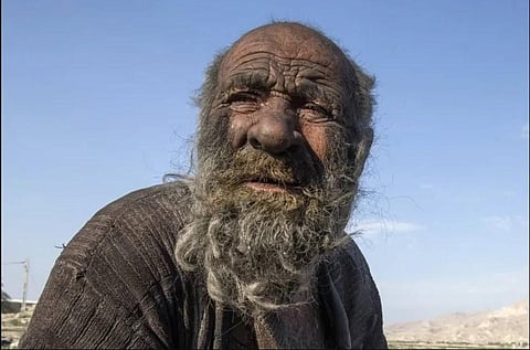 Amou Haji (uncle Haji) sits on the outskirts of the village of Dezhgah in the Dehram district of the southwestern Iranian Fars province. (Photo | AFP)