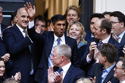 Rishi Sunak, top centre, waves after winning the Conservative Party leadership contest at the Conservative party Headquarters in London, Monday, Oct. 24, 2022.  (Photo | AP)