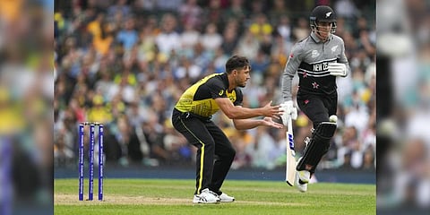 Australia's Marcus Stoinis (left) fields the ball as New Zealand's Finn Allen runs to make his ground during the T20 World Cup cricket match between Australia and New Zealand in Sydney | AP