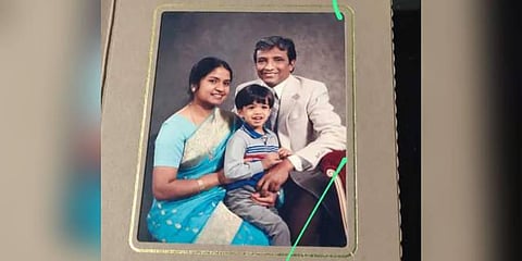 Young Justin with his parents Angelo and Pushpy.