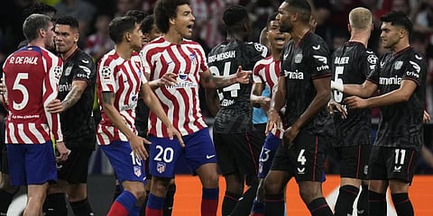 Teams' players argue during the group B Champions League soccer match between Atletico Madrid and Bayer Leverkusen.(Photo | AP)