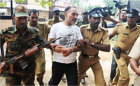 File pic of Devinder Singh alias ‘Bunty Chor’ being produced at a court in Kochi