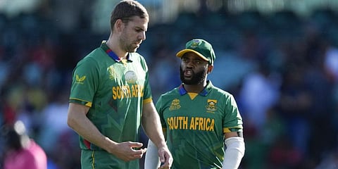 South Africa's Anrich Nortje (L) with skipper Temba Bavuma.(Photo | AP)