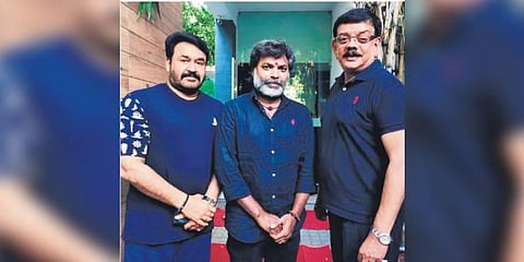 Voice artiste RP Bala (centre) with Mohanlal and Priyadarshan