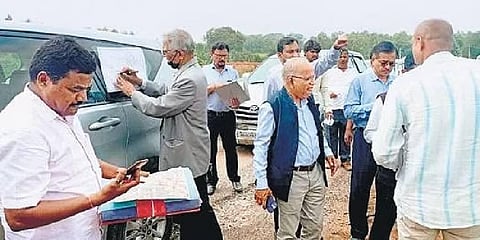 Committee members and officials inspect a site at the Dr Shivarama Karanth Layout on Friday | EXPRESS