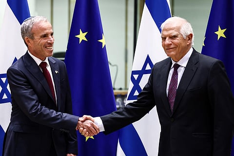 EU leader Josep Borrell (R) shakes hands with Israeli Intelligence Minister Elazar Stern (L). (Photo | AP)
