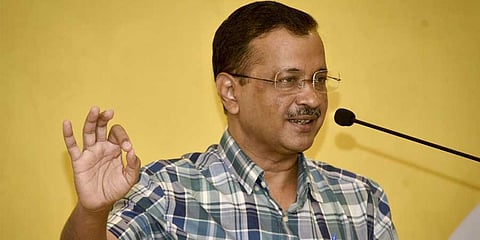 Delhi Chief Minister Arvind Kejriwal addresses a press conference in Rajkot, Sunday, Oct. 2, 2022. (PTI)