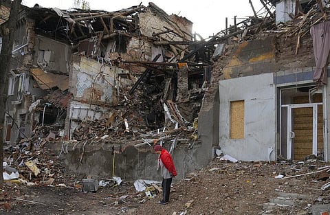 Local resident Nina, 72, stands near her house, ruined by the Russian shelling a month ago in central Slavyansk, Donetsk region, Ukraine, Saturday, Oct. 29, 2022. (Photo | AP)
