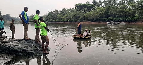 Fire and Rescue Services personnel at the Bhavani river near Mettupalayam
