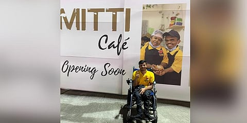 A banner announces the opening of Mitti Cafe at Bengaluru airport. (Photo | Express)