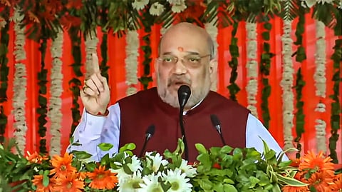 Union Home Minister Amit Shah addresses a public rally in Rajouri district (Photo | PTI)