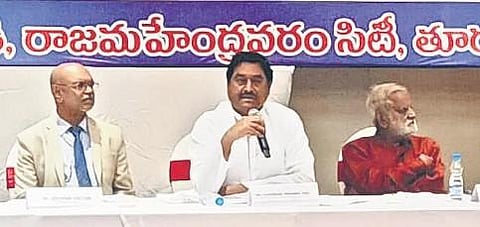 Revenue Minister Dharmana Prasada Rao speaks at a round table conference on decentralised development in Rajamahendravaram on Monday I express