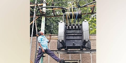 An EB worker repairs a transformer at Vepery in Chennai; Image used for representative purposes only