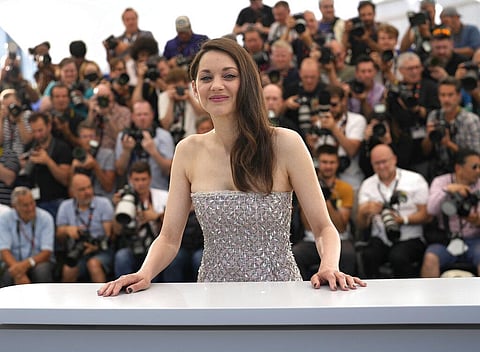 Oscar-winning actresses Marion Cotillard and Juliette Binoche, as well as other French stars of screen and music, filmed themselves chopping off locks of their hair in a video. (Photo | AP)