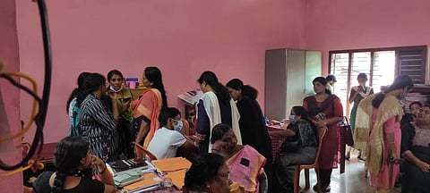 Teachers trying to console student (seen in white T-shirt)  at the Baselios Vidyanikethan Senior Secondary School. (Photo | EPS)