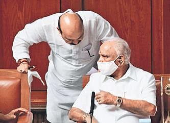 CM Basavaraj Bommai and his prede-cessor BS Yediyurappa in conversation in the Assembly (File photo)