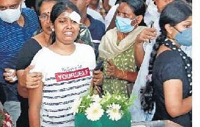 A survivor is inconsolable as she stands beside one of her classmates who died in the bus accident, at Baselious Vidyanikethan in Mulanthuruthy, Ernakulam, on Thursday | TP Sooraj