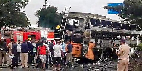 Charred remains of a bus after it hit a truck and caught fire on Aurangabad Road in Nashik district. (Photo | PTI)