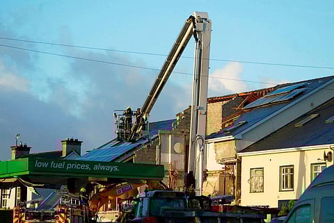 Emergency services work at the scene of an explosion at Applegreen service station in the village of Creeslough in Co Donegal, Ireland. (Photo | AP)