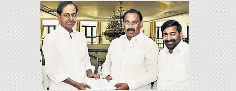 Kusukuntla Prabhakar Reddy on Friday receives B form from Chief Minister K Chandrashekar Rao to contest the Munugode byelection as Minister Jagadish Reddy looks on in Hyderabad