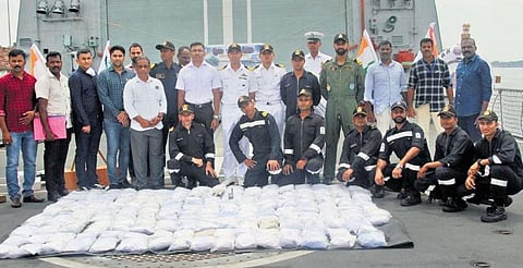 NCB officials and Indian Navy team with the drug consignment seized from Iranian fishing trawler off the Kochi coast