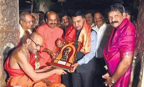 Sri Vidyasagara Theertha Swamiji felicitates Goa Chief Minister Pramod Sawant in Udupi on Saturday | Express