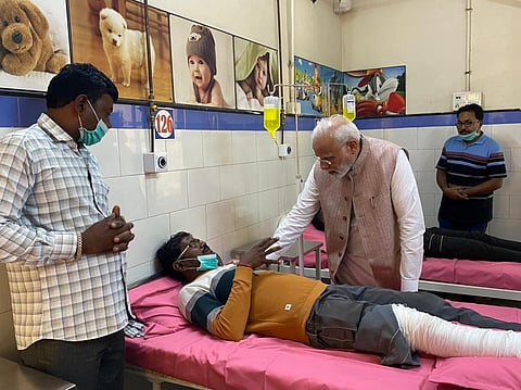 Gujarat bridge collapse: Prime Minister Narendra Modi met the injured admitted to Morbi Civil Hospital. (Photo | ANI Twitter)