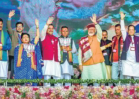 Prime Minister Narendra Modi waves at supporters during a public meeting at Chambi in Himachal Pradesh on Wednesday . (Photo| PTI)