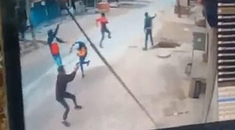 A screengrab shows a Dera Sacha Sauda follower being shot at by unknown men.