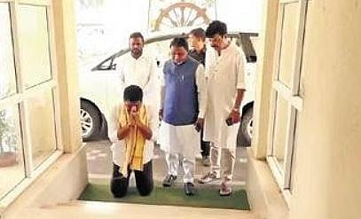Suryabanshi Suraj bows down at the Assembly steps before taking oath