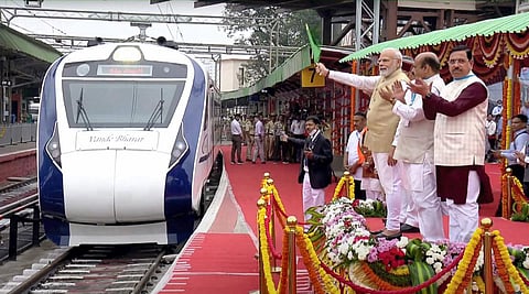 Prime Minister Narendra Modi flags off south India's first Vande Bharat Express train, connecting Mysuru and Chennai via Bengaluru, at KSR railway station in Bengaluru, on November 11, 2022. He also launched the 'Bharat Gaurav Kashi Darshan' train, inaugu