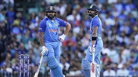 India's Rohit Sharma and Virat Kohli wait for a video review during the T20 World Cup cricket match between India and the Netherlands in Sydney, Oct. 27, 2022. 