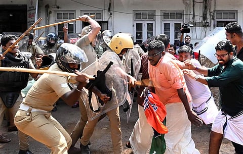 Police lathi charging Yuva Morcha workers who tried to enter the city corporation premises during their protest against the mayor in connection with the letter row. (Phot | Vincent Pulickal, EPS)