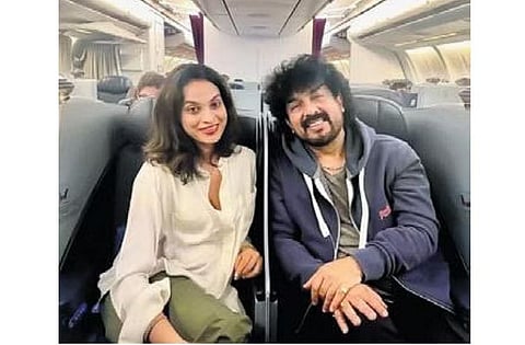 Gurukiran and his wife on the flight to Melbourne  ​