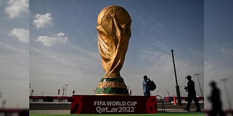 A replica of the FIFA World Cup trophy outside the Ahmed bin Ali Stadium in Al-Rayyan, Nov. 12, 2022. (Photo | AFP)