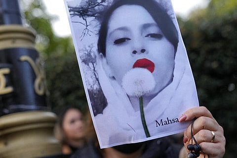 The outrage of women in Iran, and the scores supporting the protests across the world, was triggered by the killing of 22-year-old Mahsa Amini. (Photo | AP)