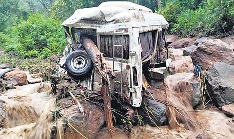 The van that was swept away in the landslide at Puthukkudi near Kundala dam in Munnar on Saturday | Express