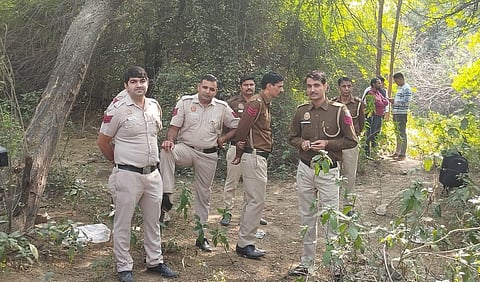 Police personnel at Mehrauli forest area amid the investigation. (Photo | Shekhar Yadav, EPS)