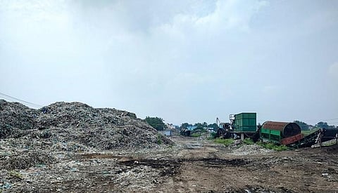 A mound of garbage at the compost yard of Thanjavur corporation await bio-mining with the trommels (on the right) not working following recent rain | Express