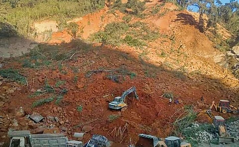 Rescue operation underway after a stone quarry caved in, at Maudarh in Hnahthial district. (Photo | PTI)