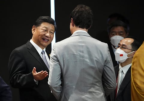Canada Prime Minister Justin Trudeau talks with Chinese President Xi Jinping at the G20 Leaders Summit in Bali (Photo | AP)