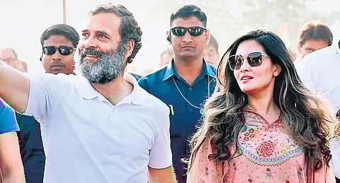 Rahul Gandhi with Bollywood actor Riya Sen during Bharat Jodo Yatra in Maharashtra’s Akola on Thursday | pti