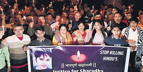 People participate in a candlelight march to protest against the murder of  Shraddha Walker’s  at Vasant Kunj  on Thursday. (Photo | Shekhar Yadav, EPS)