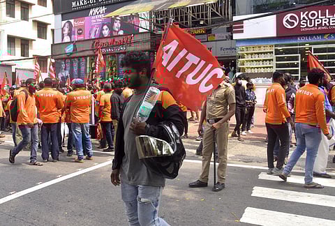 Swiggy online food delivery workers taking out a protest march to the company’s office in Kochi on Thursday. (Photo | A Sanesh, EPS)