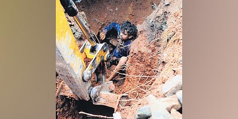 Sushant at the accident site with his leg trapped under soil
